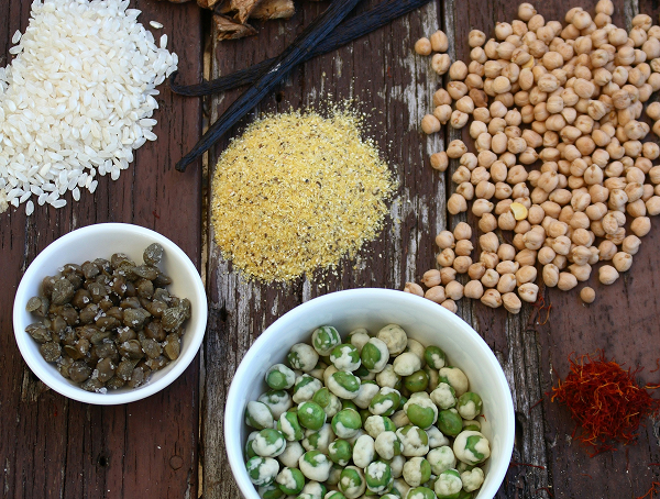 Various pulses and lentils on a wooden surface
